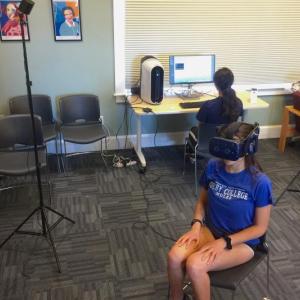 Colby College student researchers demonstrate a virtual reality experience before gathering community perceptions on offshore wind power. FRITZ FREUDENBERGER/Boothbay Register