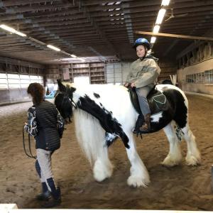 Liam enjoying one of many rides. Courtesy of Midcoast Literacy