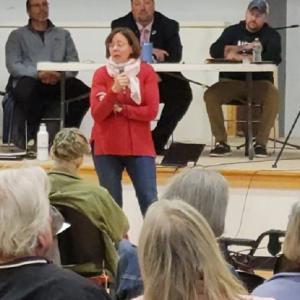 Patty Minerich, LCRC chair, introducing the panel behind her, from left, Jason Joyce, Billy Bob Faulkingham and Dustin Delano. Carol Blanton photo
