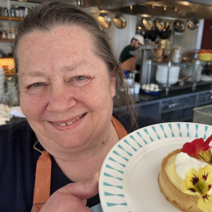 Sara Jenkins with Nina June's famous Lemon Curd Tartlet that is their "Into the Light!” offering, July proceeds from this dessert benefit Maine’s domestic abuse survivors. Photo by Patrisha McLean