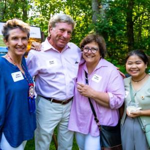 FTD co-founder Jane McBride, Captain Brad Collins, supporter Ellen Ishkanian and Thai daughter Jun enjoying the Sunflower Celebration. Courtesy of FTD