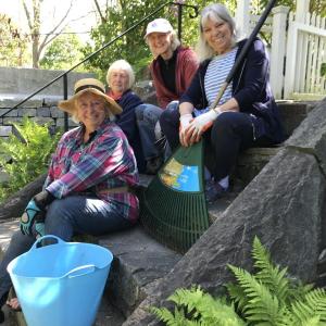 Sunken Garden team for spring cleanup: Pictured are Terry Heller (bottom step), Sandy Beesecker, Tina Sedney and Brenda Lacombe (with rake). Emily Adler photo