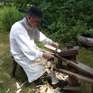 Revolutionary War reenactors will be at Pownalborough Court House on Sept. 30. Peter Morrissey makes shingles on a shaving horse. Courtesy of LCHA