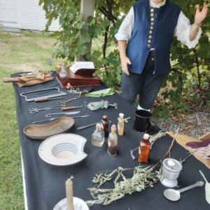 Jack Fourier demonstrates 18th century physician instruments. Fourier is a member of the 1777 re-enactors who will do shape note singing Sept. 16 in Dresden. Courtesy photo