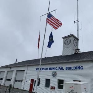 Flags at half staff at Woolwich town office in the wake of the mass shootings in Lewiston. SUSAN JOHNS/Wiscasset Newspaper