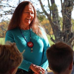 Passamaquoddy educator Sandra Bassett teaches a school group at Coastal Rivers Salt Bay Farm. Courtesy photo