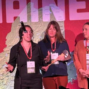 From left, Jess Donohoe, Haley Bezon and Lauren Cucci accept the MOB Trailblazer Award for the Outdoo Innovation of the Year. Courtesy photo