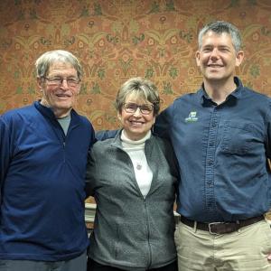 Steve and Karen O’Bryan with Coastal Rivers Executive Director Steven Hufnagel, right, after completing the donation of a conservation easement on the couple’s land in Damariscotta. Courtesy photo