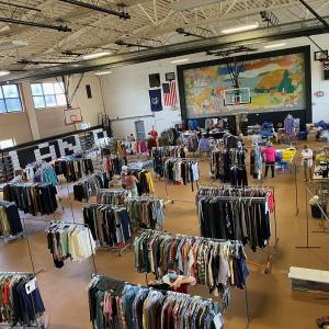 Shop for Hope volunteers ready the space for New Hope's annual sale. Courtesy photo