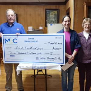 From left, Worshipful Master Allen Hersom, Brother Jeff Averill accepting for Alna Food Bank, Brie DiPerri of St. Philip’s Help Yourself Shelf and Feed Our Scholars program, Marjorie DiVece of Edgecomb Community Church, and Brother Paul Bonyun accepting for Westport’s Food Bank. Courtesy photo
