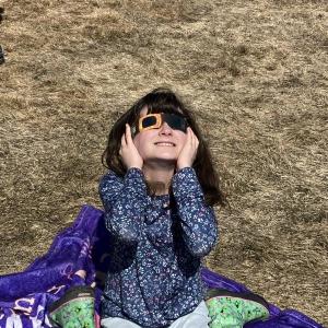 Emelia Underwood takes in the eclipse. Becky Hallowell photo