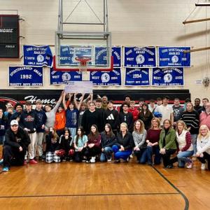 First National Bank presents Wiscasset Middle High School with a check for $5,000 toward a new scoreboard. Courtesy photo