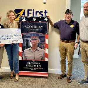 Accepting for American Legion Post 36 is Sue Burge, left, with First National Bank’s Alyssa Allen, Jim Singer of Post 36, and First National Bank Branch Manager, Adam Climo. Courtesy photo