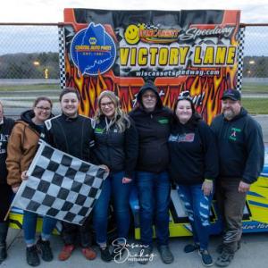 Jon Emerson and family happily celebrate his first career Late Model win. Jasen Dickey Photography