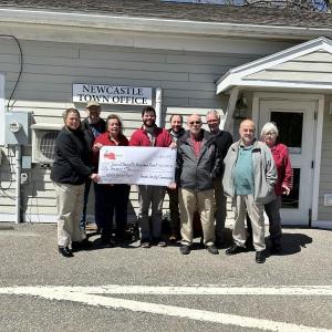 Pictured from left are: Carrie Kipfer (LC Administrator), Jim Corbett (LCI Manager of Engineering/OSP Engineer), Carol Miller (Newcastle Broadband Committee), Evan Goodkowsky (Coastal Maine Reg Broadband), Kevin Sutherland (Newcastle Town Manager), David Levesque (Newcastle Broadband Committee), Alan Hinsey (LCI Director of Marketing and Sales), Randal Manning (LCI Vice President of Operations and Engineering), and Mary Ellen Barnes (CMRB). Courtesy photo