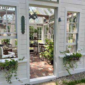 One of the properties on LCHA’s garden tour includes this delightful potting shed, constructed by the owner from many vintage windows. Courtesy photo