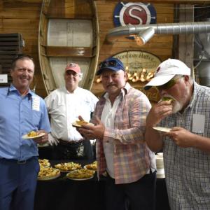 Rick Carmolli, Mark Gimbel, and Doug Gimbel at the Mine Oyster table. That’s Chef Ralph Smith behind the table. LISA KRISTOFF/Boothbay Register