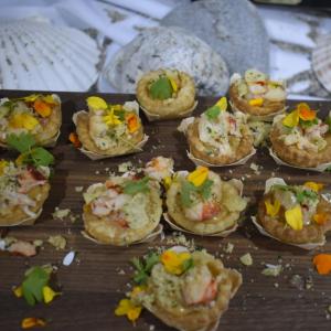 Paul’s Bistro lobster bite: Lobster Pie: lobster, white wine, fresh herbs, Ritz cracker and Cape Cod chips topping in a handmade crust. LISA KRISTOFF/Boothbay Register