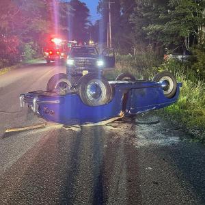 The overturned Porsche on Back Narrows Road on Friday, July 19. Mark Sullivan photo