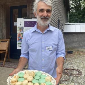 Alain Ollier with macaron. Photo Erica Berman Alain Ollier with macaron. Photo Erica Berman