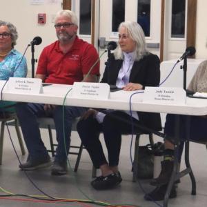 From left: Senate District 24 candidates Suzanne Andresen, I-West Bath; Jeffrey Pierce, R-Dresden; Denise Tepler, D-Topsham; and House District 53 candidate Judith "Judy" Tunkle, D-Dresden; smile as audience members applaud at the end of a forum at Pownalborough Hall in Dresden the evening of Monday, Sept. 30. Piper Pavelich photo Dresden panel