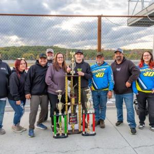 Dan Mckeage Jr. and team celebrate after Dan was named the Driver of the Year at Wiscasset Speedway. Jasen Dickey Photography Dan Mckeage Jr. and team