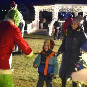 Boy meets the Grinch on the Boothbay Common. LISA KRISTOFF/Boothbay Register