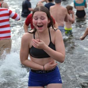 Sophia Mansfield shows her feelings after leaving a cold Linekin Bay during the Penguin Plunge on Jan. 1. KEVIN BURNHAM/Boothbay Register