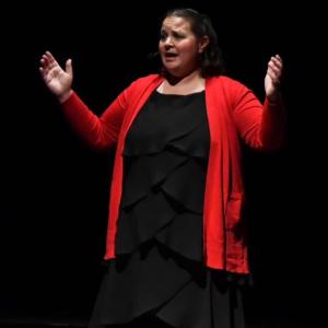  The Y Arts Director, Emily Mirabile, performed "Christmas Lullaby" from Songs For a New World. 