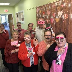 Staff members at the Family Care Center celebrate Valentine's Day. KEVIN BURNHAM/Boothbay Register