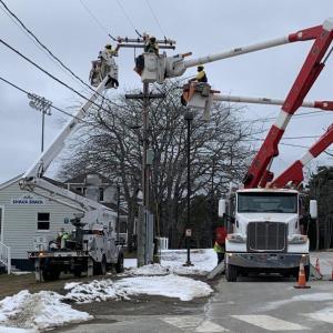 Replacing equipment on a utility pole at Boothbay Region High School. KEVIN BURNHAM/Boothbay Register