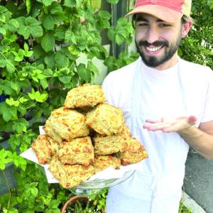 Treats’ Brad McCrary with savory bacon chive biscuits. Courtesy of Stacy Linehan 