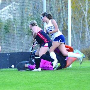 Moriah Smith scores an overtime goal for the Boothbay Region High School field hockey team. KEVIN BURNHAM/Boothbay Register KEVIN BURNHAM/Boothbay Register