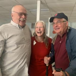 2025 Maine Teacher of the Year Becky Hallowell, who teaches fourth grade at Wiscasset Elementary School, is flanked by her uncles Michael “Jim” Bilinsky, left, and Daniel Fortin Oct. 10 at a reception after Hallowell learned she’d won the statewide honor. SUSAN JOHNS/Wiscasset Newspaper 