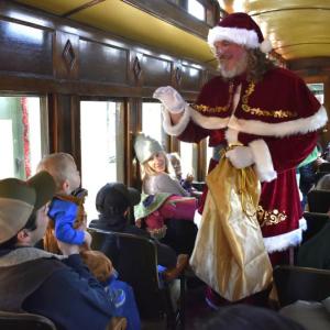 Santa greets passengers on the train during the North Pole Express. ISABELLE CURTIS/Boothbay Register