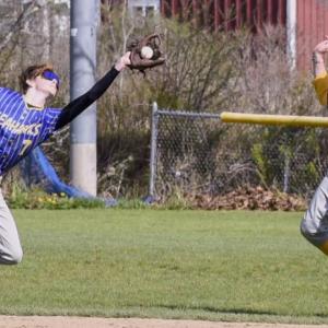Seahawk Sam Markowitz reaches for a catch as teammate Casey Phelps moves out of the way at a game against Mt. View May 10. FRITZ FREUDENBERGER/Boothbay Register