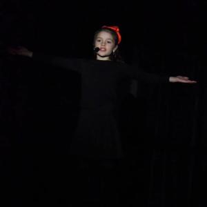 Iris Adams opens the show with an endearing performance of "Where Are You, Christmas?"   