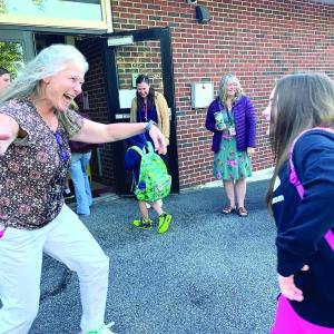 Wiscasset Elementary School fourth grade teacher and Lincoln County Teacher of the Year Becky Hallowell, who a month later would be named Maine Teacher of the Year, greets incoming fifth grader Patience Davis Tuesday morning, Sept. 3, the start of the new school year. SUSAN JOHNS/Wiscasset Newspaper 