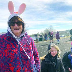 Enjoying Wiscasset’s Easter egg hunt March 30, in rabbit ears and the sun and gusty winds the event usually gets. SUSAN JOHNS/Wiscasset Newspaper 