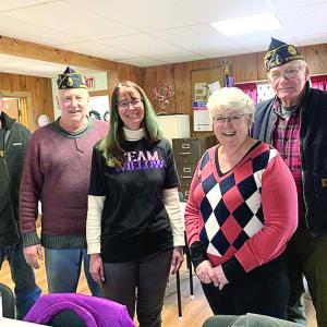 From left, American Legion Post 54’s Cliff Hendricks and Mike Barnes, Team Willow’s Beth Bluteau, Cooper-DiPerri Scholarship Fund Committee member Sheila Sawyer and Post 54 Cmdr. William Cossette Jr. gather at the Legion hall on Route One, Wiscasset March 22 to talk about the post’s recent donations to both causes. SUSAN JOHNS/Wiscasset Newspaper 