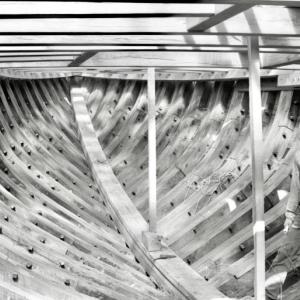 Skipper John S. Nugent III inside the hull of the Bowdoin during the schooner’s four-year reconstruction at Maine Maritime Museum in Bath. PHIL DI VECE photo