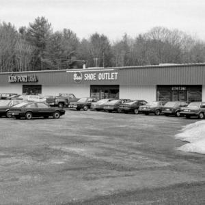 The white building was moved and put up for sale to accommodate construction of a strip mall.  PHIL DI VECE photo