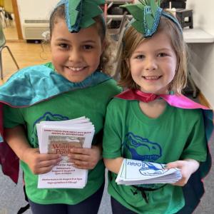 Penny Navarrete and Addie Adams hand out programs. Courtesy of Emily Mirabile