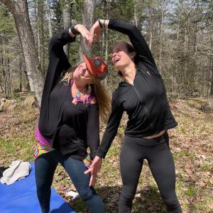 Retreat attendees connect with some heart yoga. Courtesy of Hearty Roots