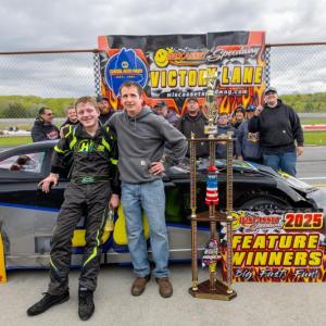 Daniel Harding poses with his dad Dan with the #38 crew behind them. Jasen Dickey Photography
