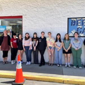 The Wiscasset High School YSUP team is joined by Officer Farrel and Officer Solorzano to place stickers on alcohol products at the Mobil Clipper Mart. Courtesy photo YSUP team