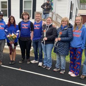It was Senior Night May 20 for the Boothbay/Wiscasset track and field team. Pictured, from left, Shelley, Ed and Anna Strozier, Charlotte Cox, Chase Mansfield, Leah Plummer, and Jen, Maddie and Eric Orchard. BILL PEARSON/Boothbay Register parents