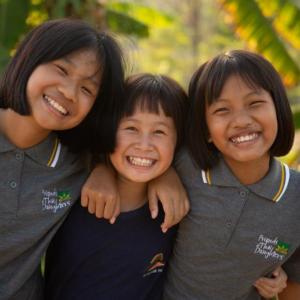 These three young girls are currently being supported at Friends of Thai Daughters’ Sunflower Farm in Mae Chan, Northern Thailand. Courtesy of FTD