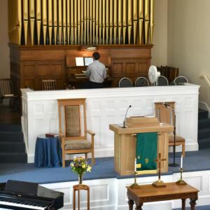 Joel Pierce, the church’s music director, organist and choir director plays the church's current organ manufactured by the Estey Organ Company in 1909. PHIL DI VECE/Wiscasset Newspaper