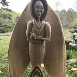Hand-carved wooden sculpture by Keith Plummer